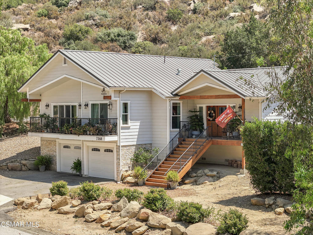 7368 Santa Susana Pass Road Simi Valley, CA 93063 - Photo 6 of 48 a front view of house with yard outdoor seating and barbeque oven