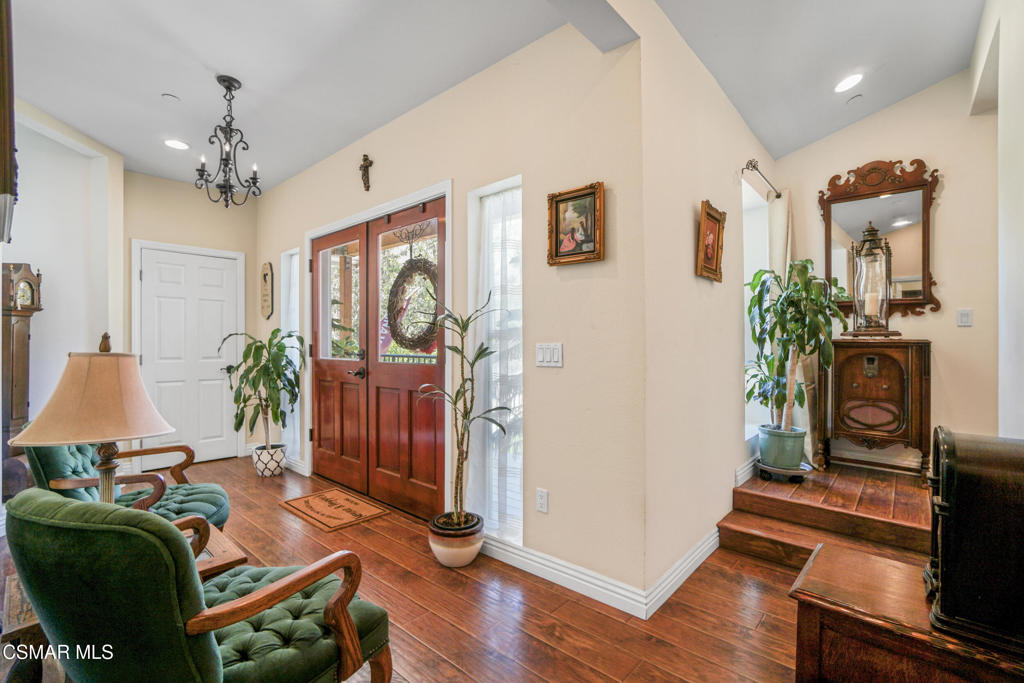 7368 Santa Susana Pass Road Simi Valley, CA 93063 - Photo 8 of 48 a living room with furniture and wooden floor