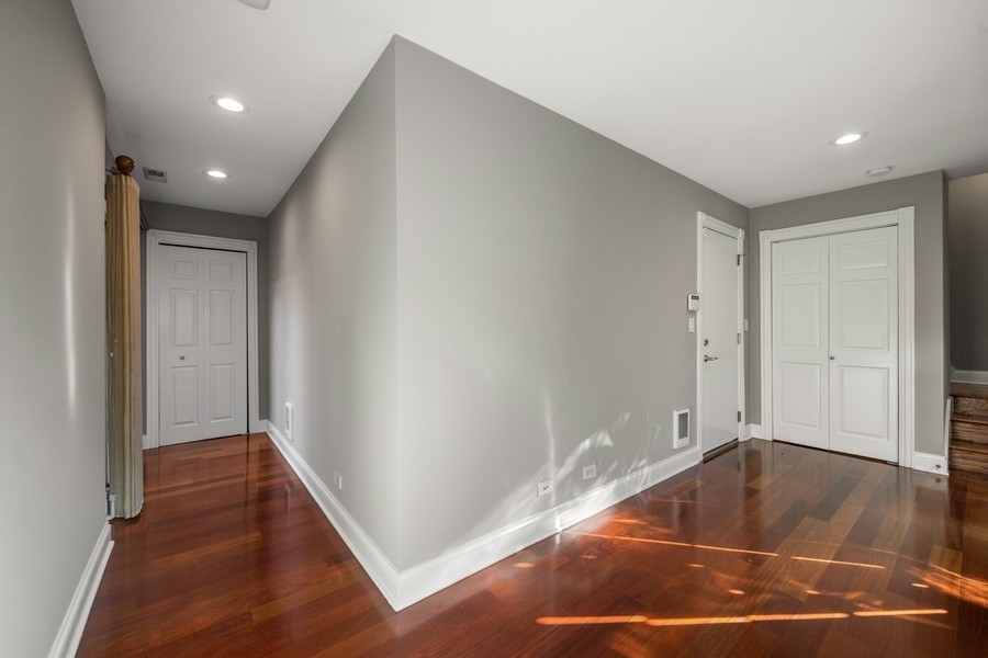 2340 West Adams Street, Unit 33 Chicago, IL 60612 - Photo 8 of 17 a view of entryway with wooden floor