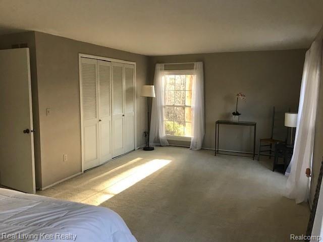 1403 Paddle Wheel Lane Rochester, MI 48306 - Photo 26 of 54 Master Bedroom freshly painted loads of Natural Sunlight and lots of closet space. Total of 3 closets.