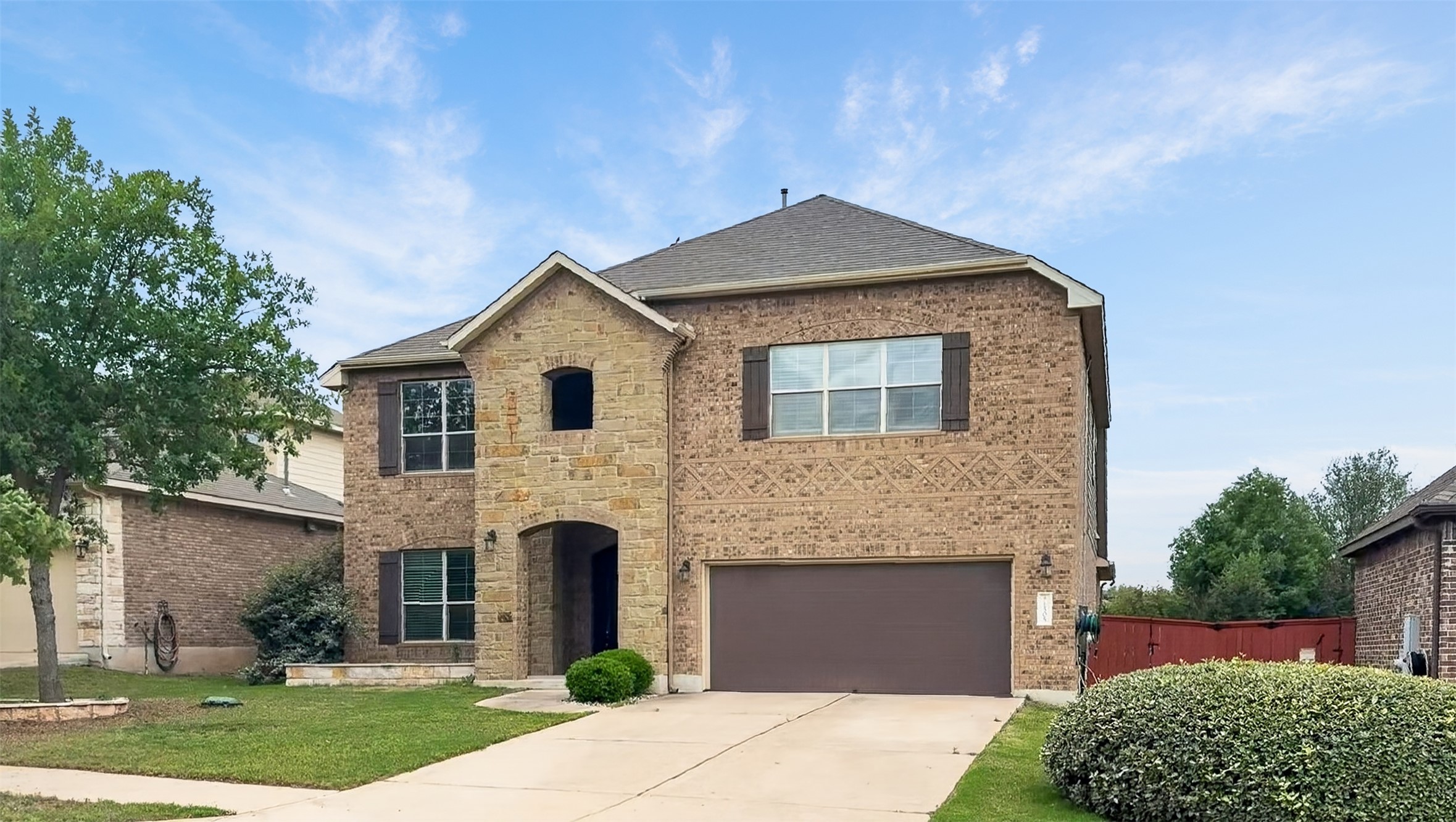 1505 Long Shadow Lane Georgetown, TX 78628 - Photo 28 of 28 Two-story brick and stone exterior with an attached two-car garage