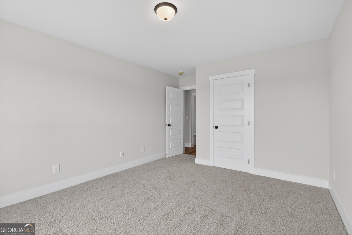 206 Airport Road, Unit 11 Canon, GA 30520 - Photo 28 of 34 a view of an empty room