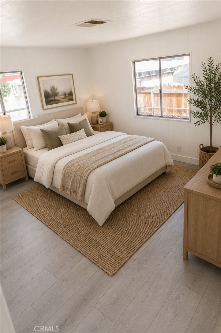 995 Pomona Road, Unit 33 Corona, CA 92882 - Photo 15 of 25 a bedroom with bed and window