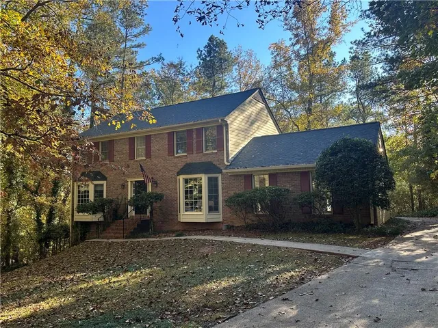 a view of a yard in front of a house