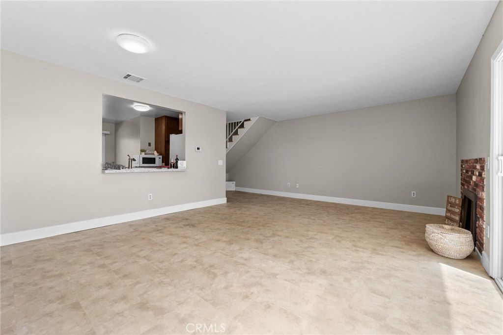 4679 Maxwell Court Riverside, CA 92501 - Photo 11 of 45 Living room with view of kitchen passthru