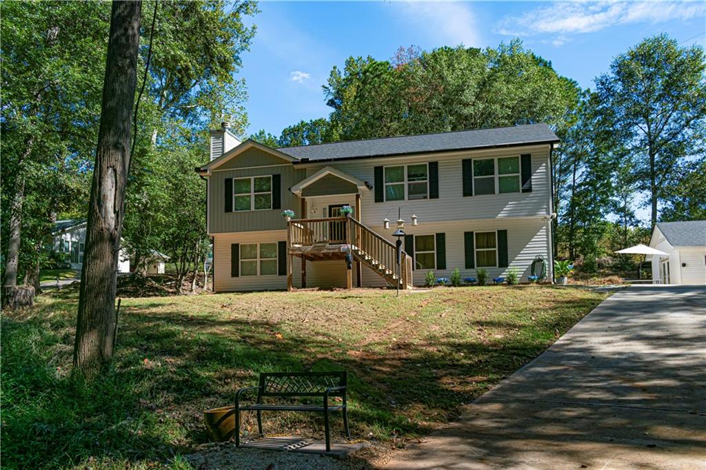 3336 Donna Way Gainesville, GA 30504 - Photo 1 of 30 a front view of a house with a yard