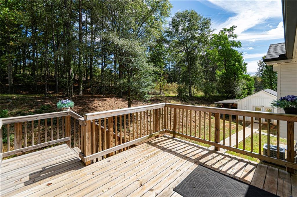 3336 Donna Way Gainesville, GA 30504 - Photo 25 of 30 a view of balcony with wooden floor and fence