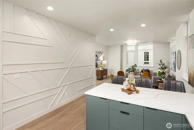 a view of a kitchen and sink