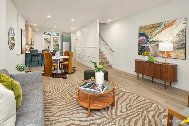 a living room with furniture and a table