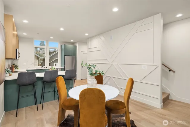 a view of a dining room with furniture