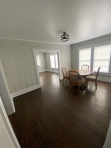 a view of livingroom with furniture wooden floor and window