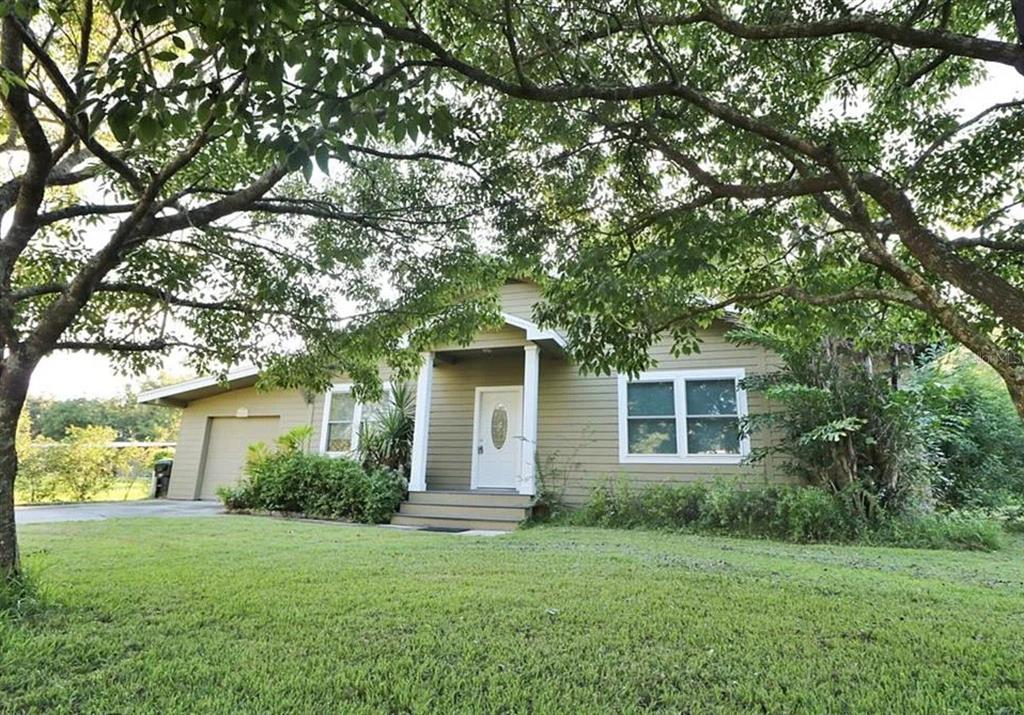 4472 Fairview Avenue Orlando, FL 32804 - Photo 3 of 18 a front view of house with yard and trees