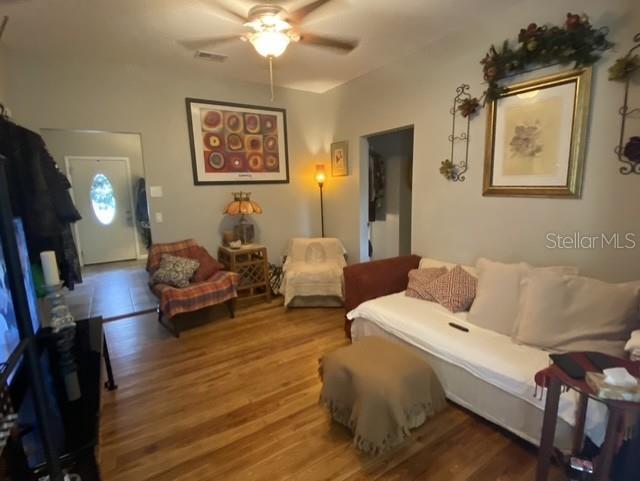 4472 Fairview Avenue Orlando, FL 32804 - Photo 5 of 18 a living room with furniture and a flat screen tv