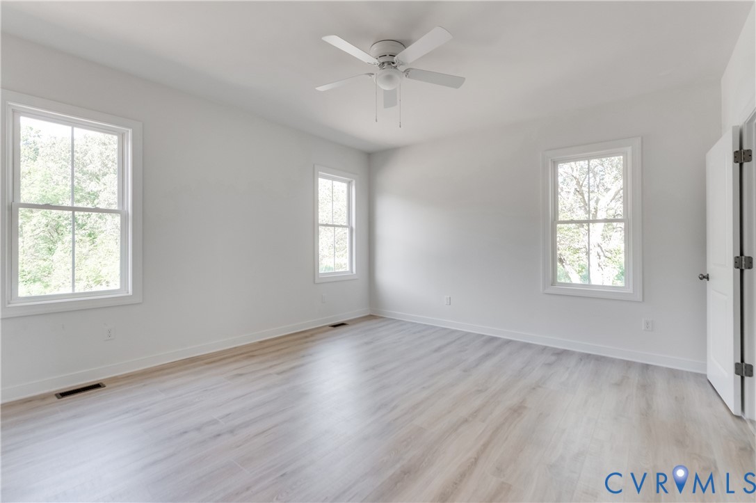 1393 Broad St Road Oilville, VA 23129 - Photo 22 of 39 Spare room with light wood-style floors, healthy a