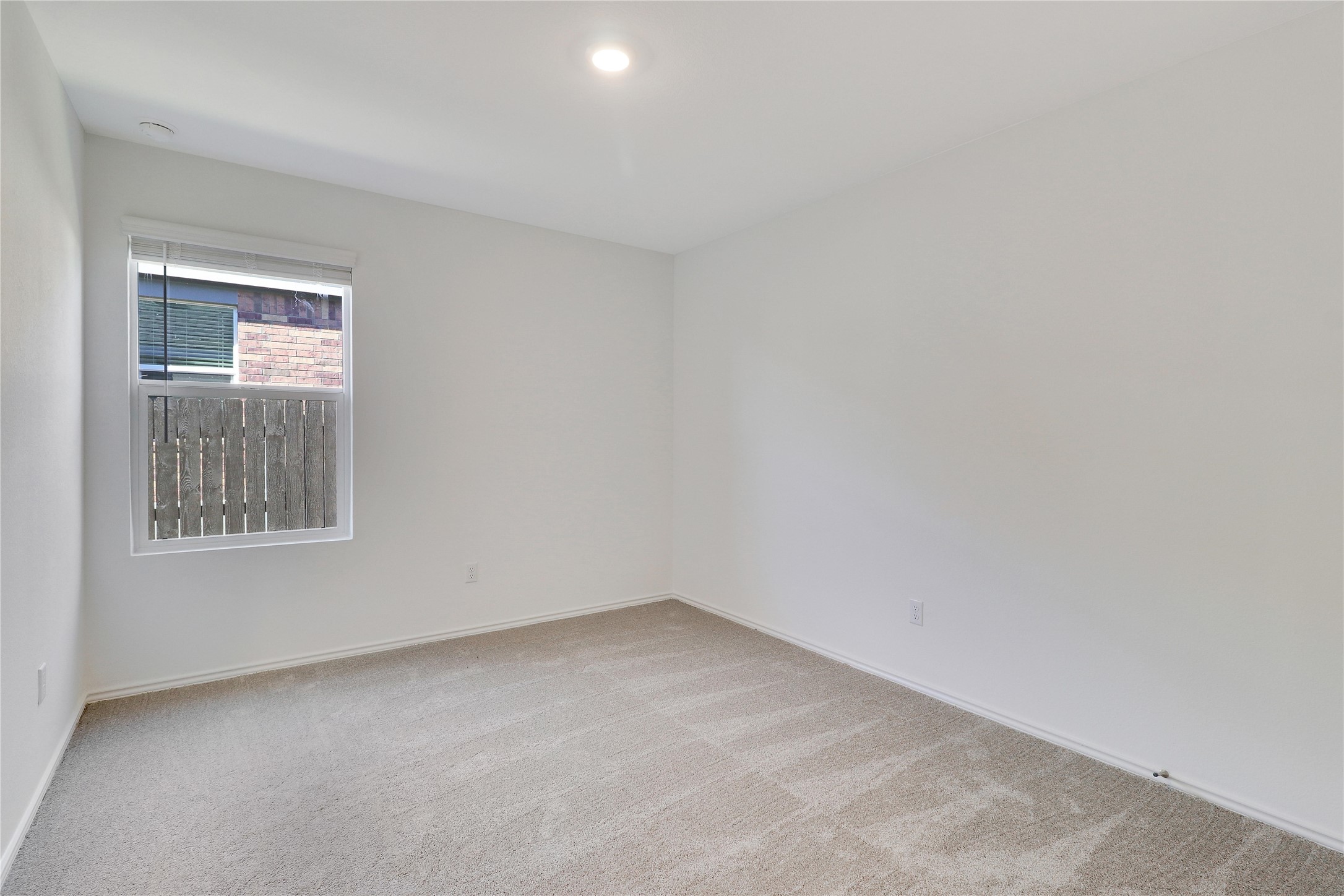 2524 Four Waters Loop Georgetown, TX 78628 - Photo 27 of 36 an empty room with a window