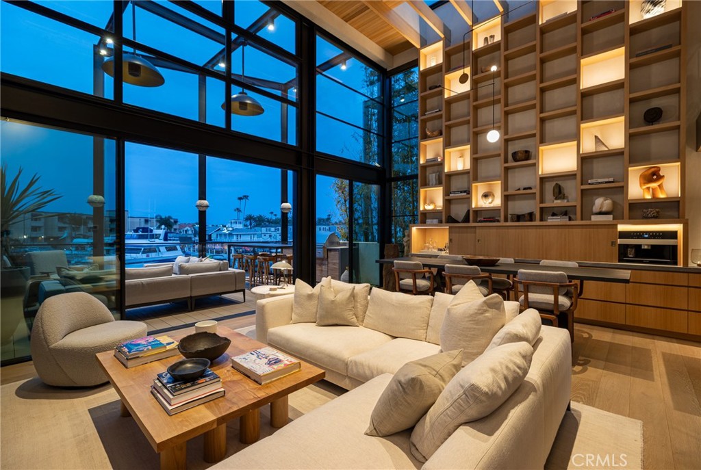 a view of a patio with couches and a fire pit
