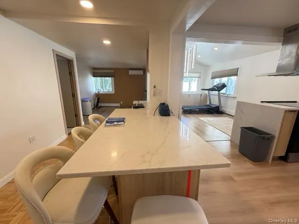a living room with a couch and a table