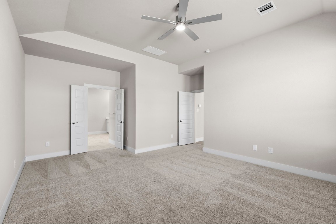 2137 Golden Spruce Court Conroe, TX 77301 - Photo 13 of 41 an empty room with fan and entrance