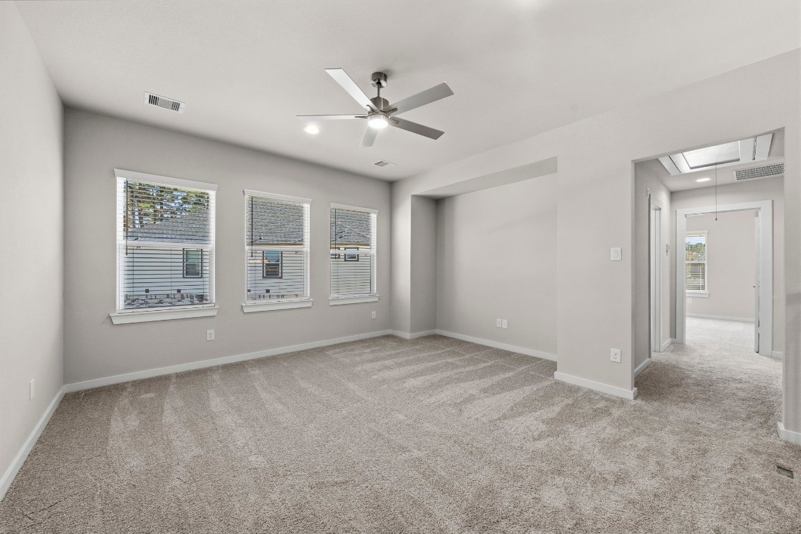 2137 Golden Spruce Court Conroe, TX 77301 - Photo 21 of 41 a view of an empty room with a window