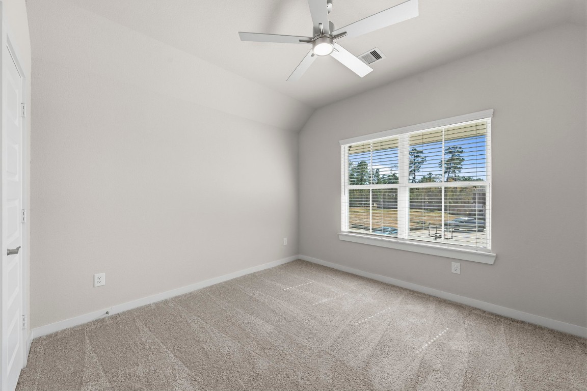 2137 Golden Spruce Court Conroe, TX 77301 - Photo 24 of 41 an empty room with a window