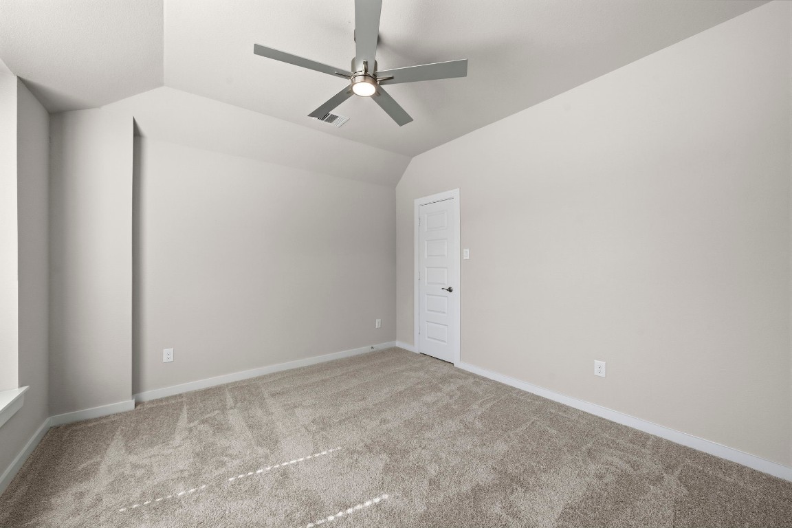 2137 Golden Spruce Court Conroe, TX 77301 - Photo 26 of 41 a view of a big room with a fan