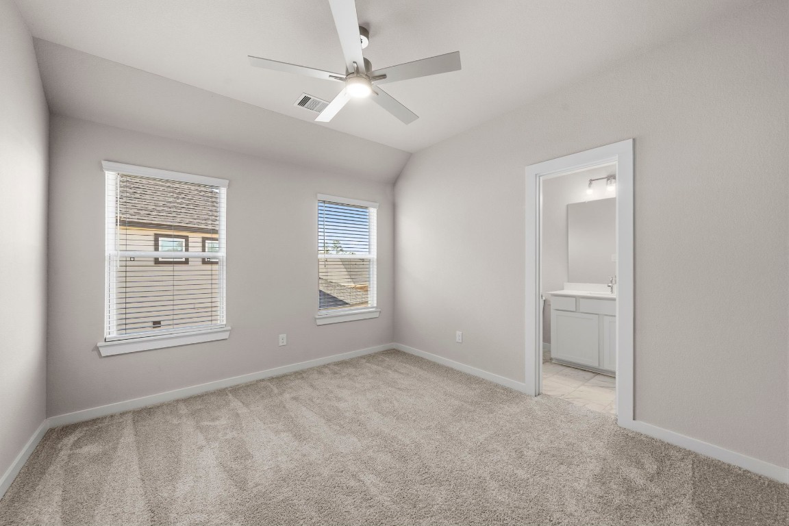 2137 Golden Spruce Court Conroe, TX 77301 - Photo 29 of 41 a view of an empty room with a window