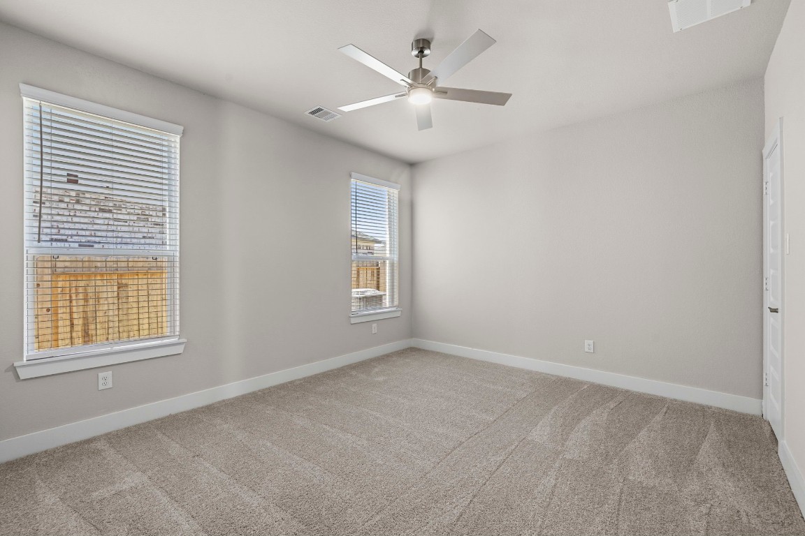 2137 Golden Spruce Court Conroe, TX 77301 - Photo 32 of 41 a view of an empty room with a window