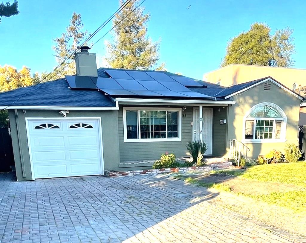 a front view of a house with a yard outdoor seating and yard