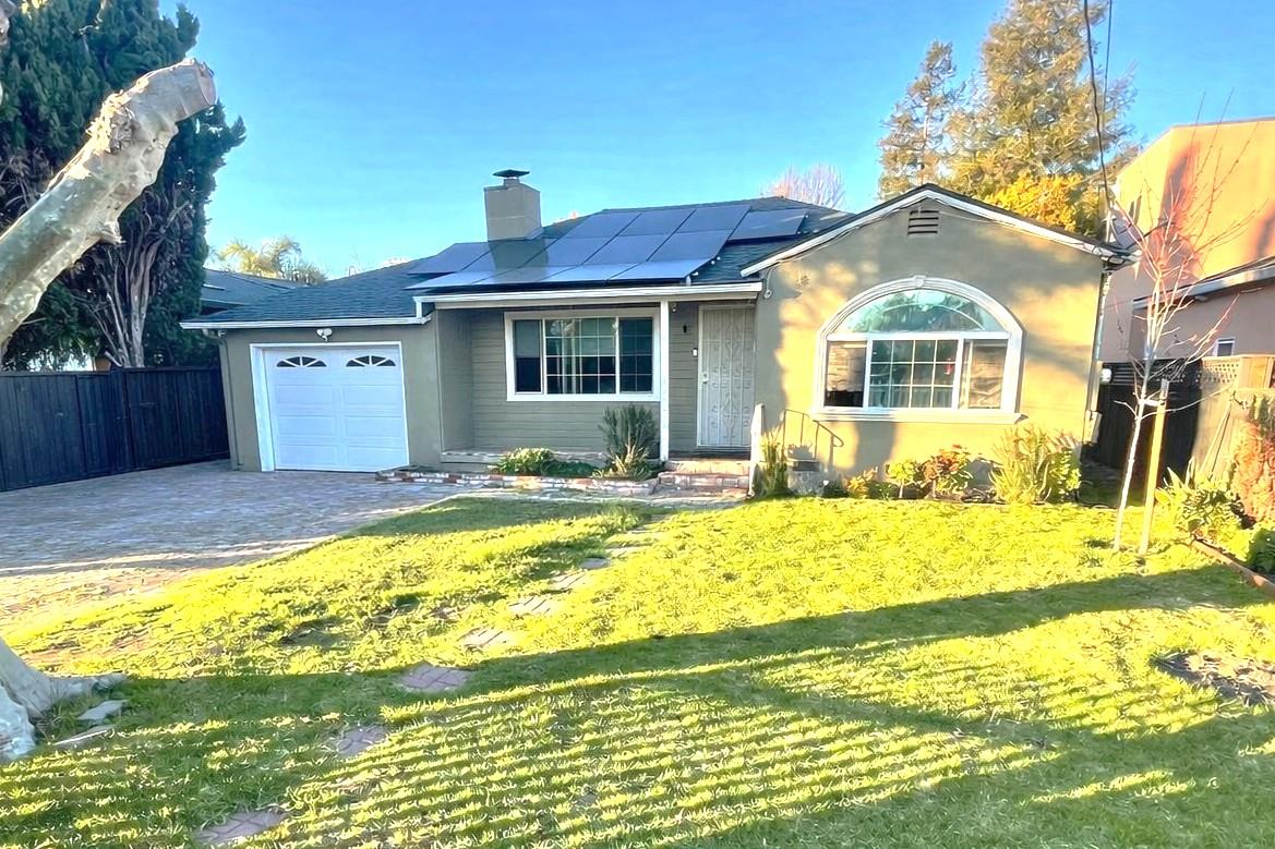 3223 Spring Street Redwood City, CA 94063 - Photo 2 of 14 a front view of a house with a yard outdoor seating and yard