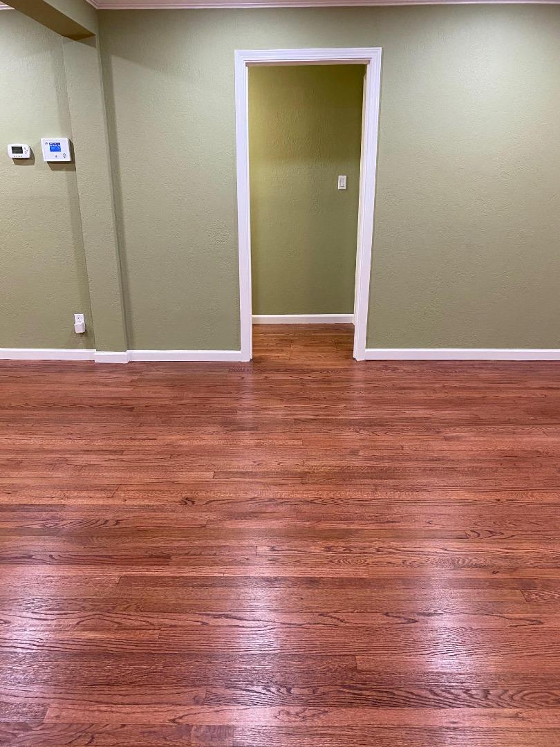 3223 Spring Street Redwood City, CA 94063 - Photo 6 of 10 a view of a room with wooden floor