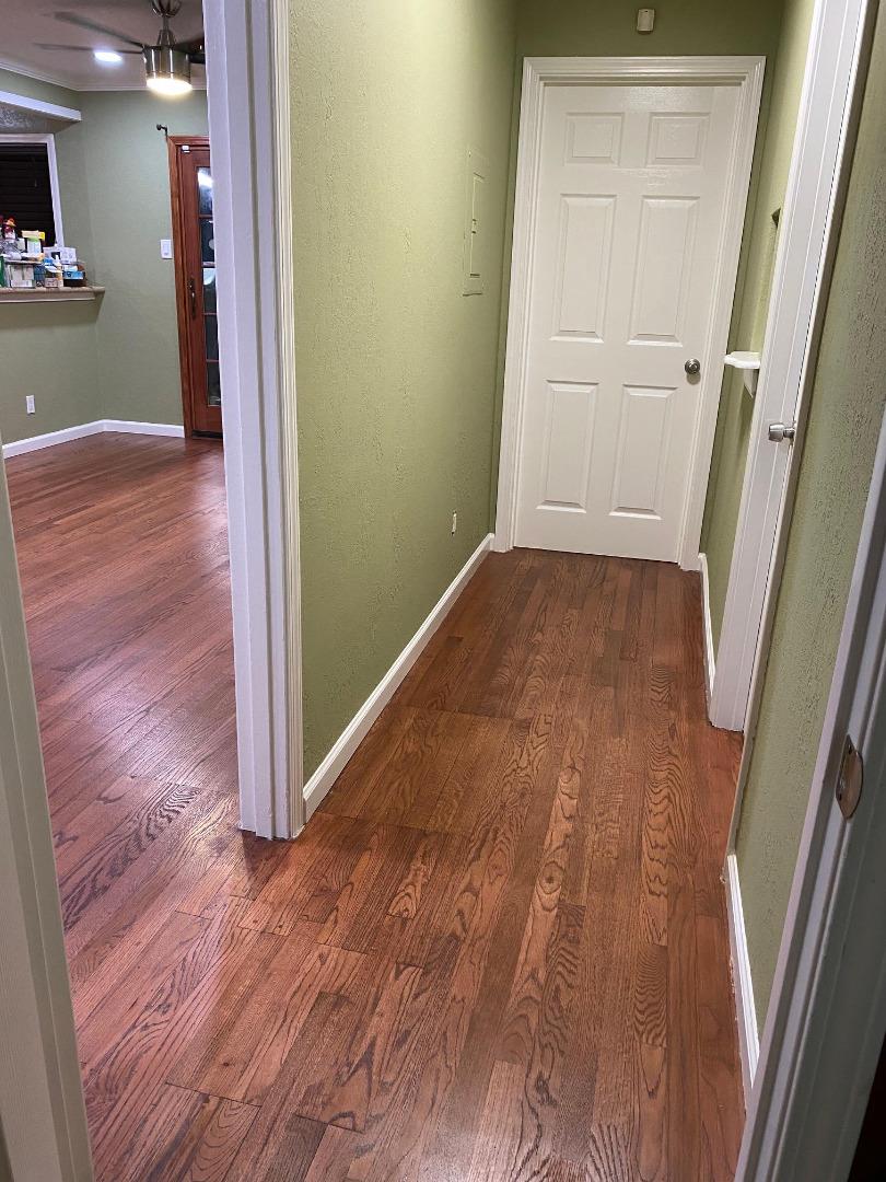 3223 Spring Street Redwood City, CA 94063 - Photo 7 of 10 a view of a hallway with wooden floor