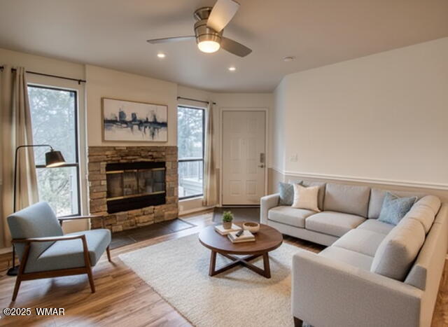 a living room with furniture and a fireplace