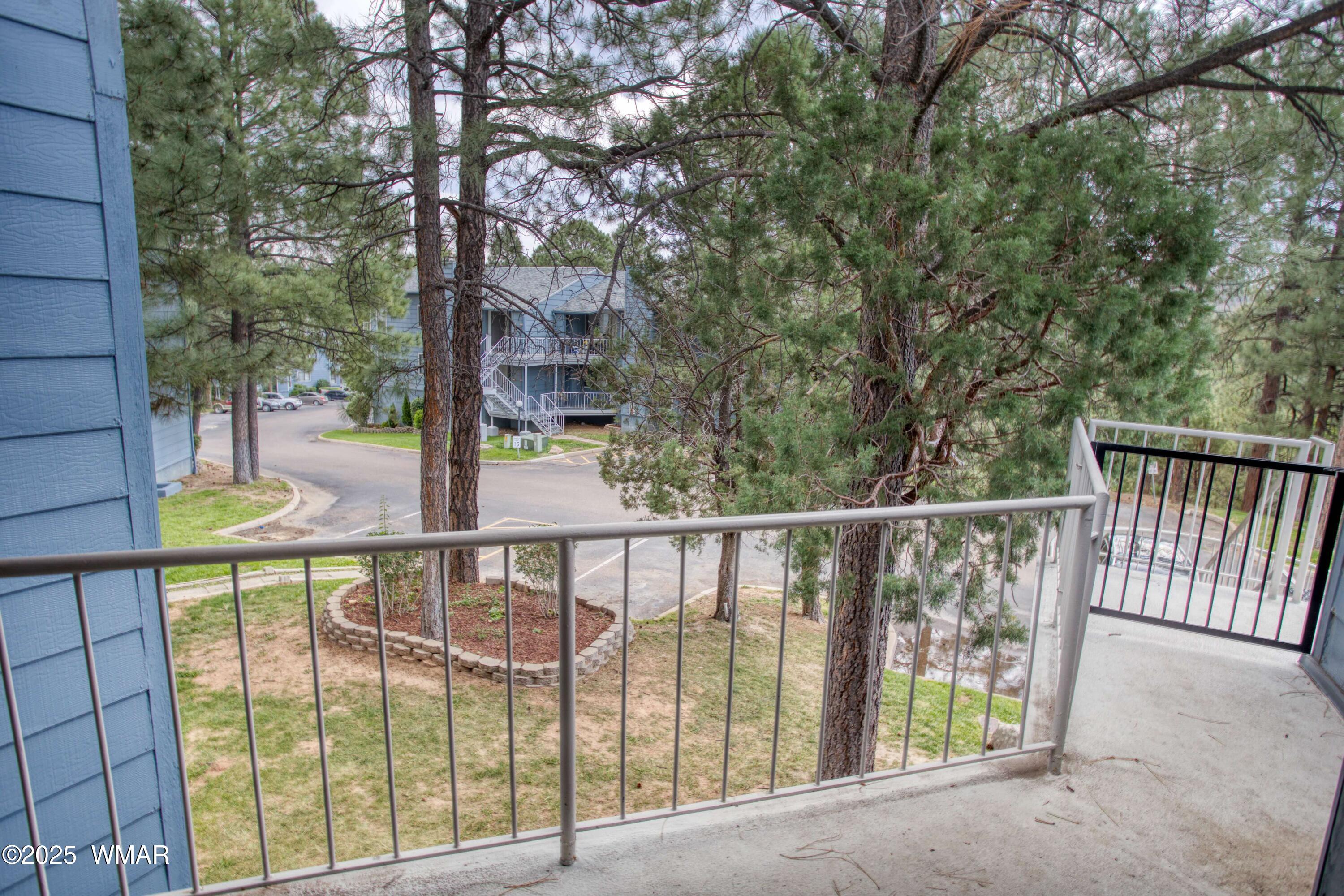 2700 South White Mountain Road, Unit 122 Show Low, AZ 85901 - Photo 24 of 25 a view of a balcony