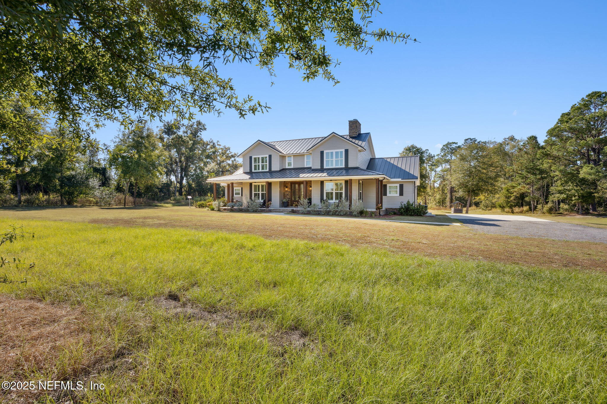 272272 Conner-Nelson Hilliard, FL 32046 - Photo 11 of 75 a front view of a house with a yard