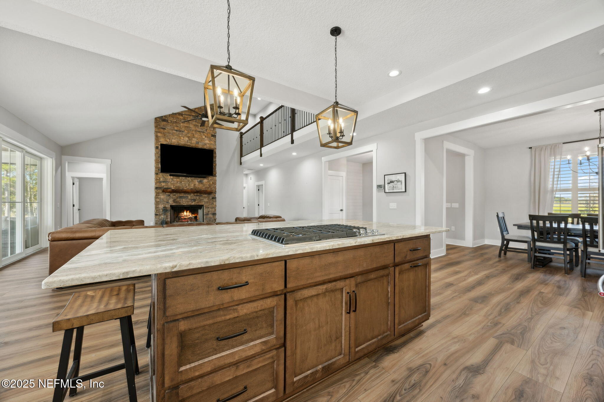 272272 Conner-Nelson Hilliard, FL 32046 - Photo 20 of 75 a kitchen with stainless steel appliances granite countertop a stove and a wooden floors
