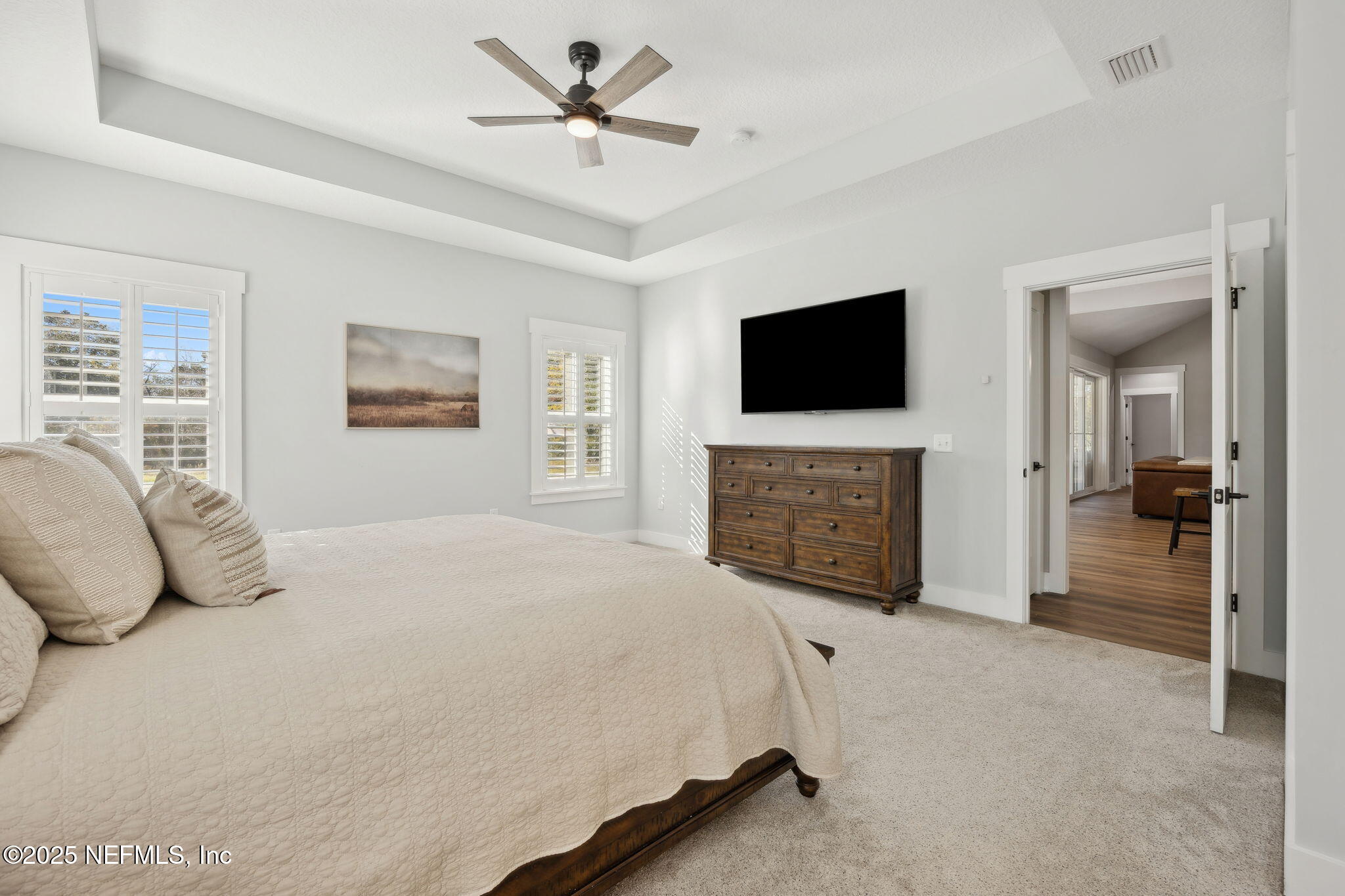 272272 Conner-Nelson Hilliard, FL 32046 - Photo 27 of 75 a bedroom with a bed and a television