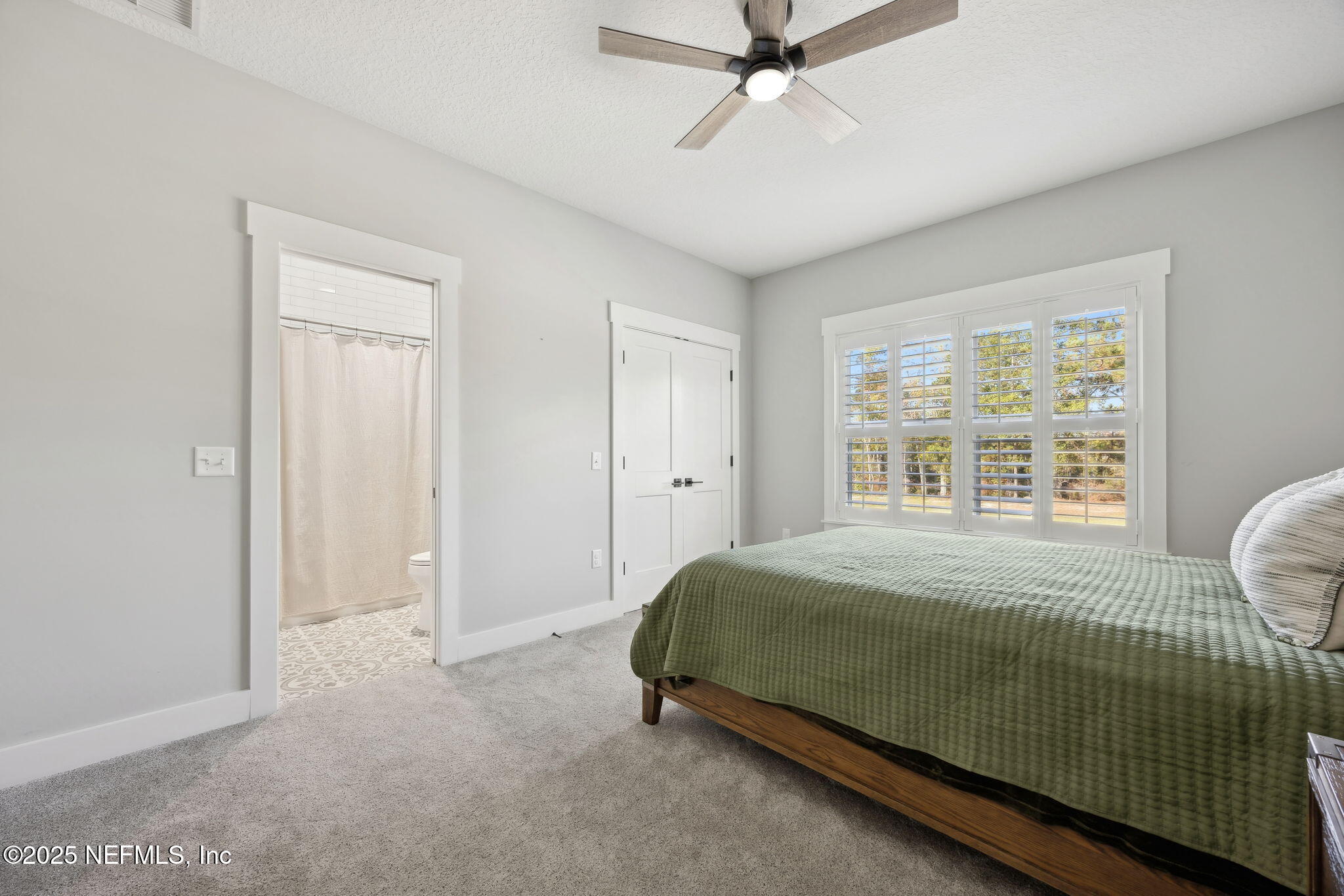 272272 Conner-Nelson Hilliard, FL 32046 - Photo 33 of 75 a bedroom with a bed and window