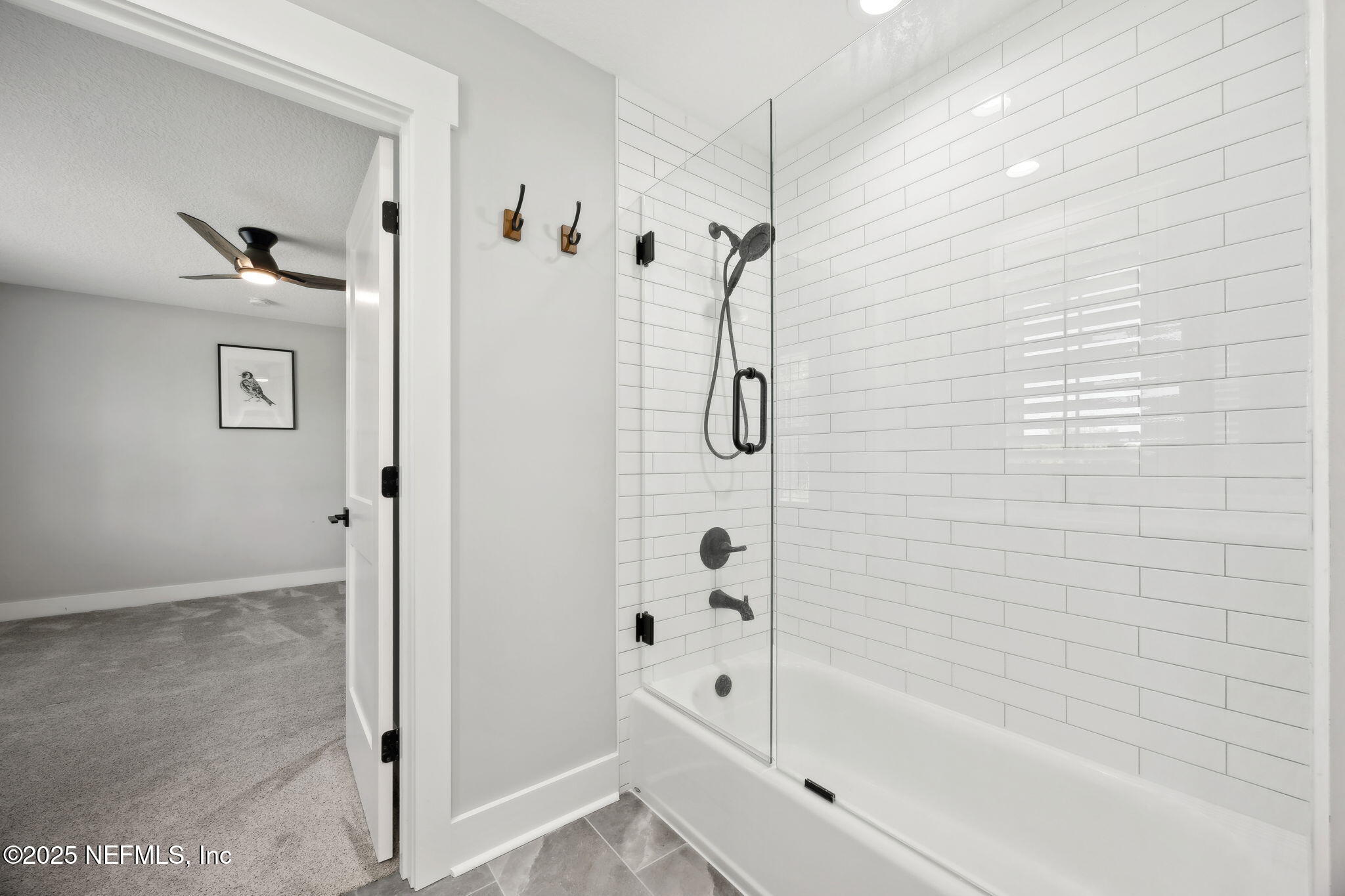 272272 Conner-Nelson Hilliard, FL 32046 - Photo 40 of 75 a bathroom with a bathtub