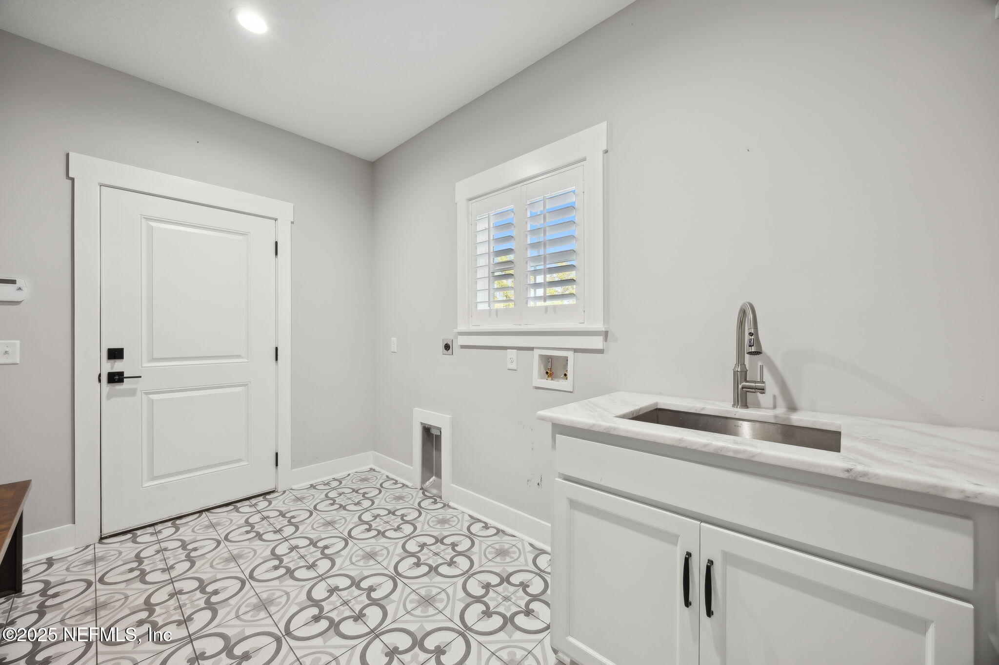 272272 Conner-Nelson Hilliard, FL 32046 - Photo 44 of 75 a bathroom with a sink and a vanity