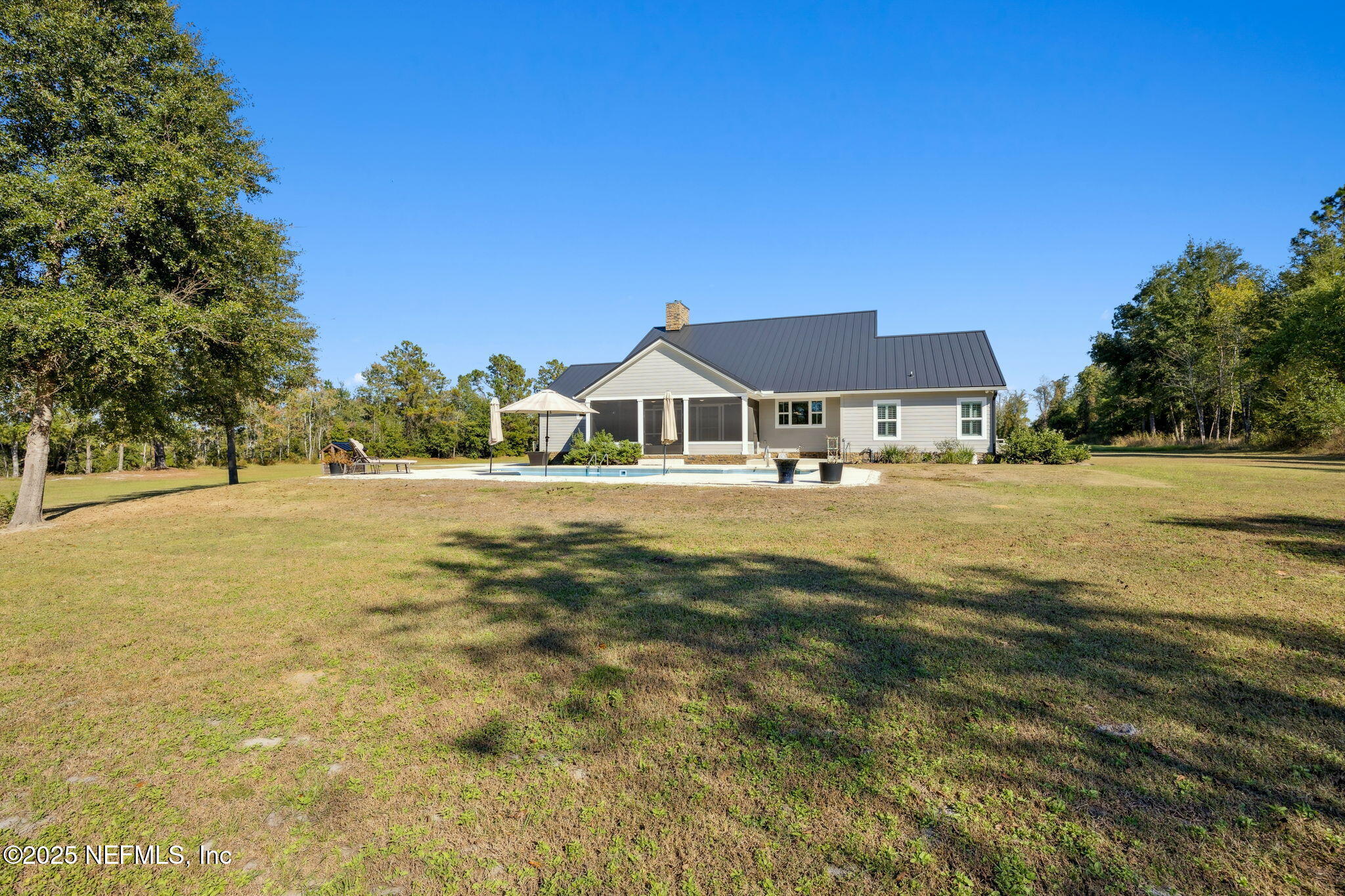 272272 Conner-Nelson Hilliard, FL 32046 - Photo 55 of 75 a view of a house with a yard