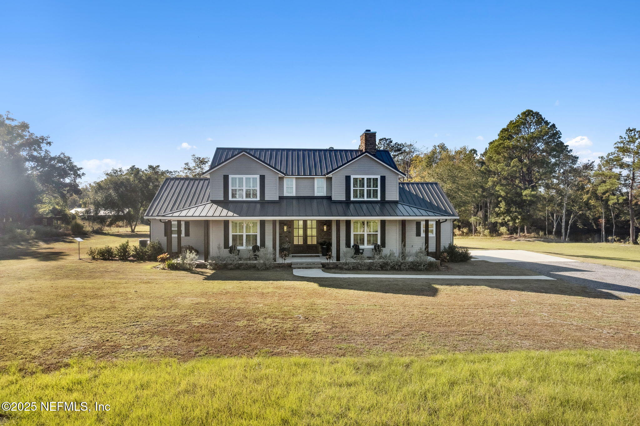 272272 Conner-Nelson Hilliard, FL 32046 - Photo 59 of 75 a front view of a house with a yard