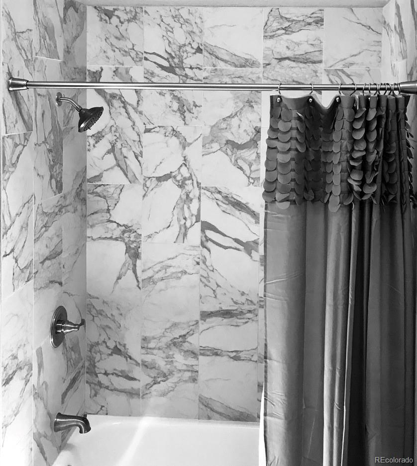23072 Pinecrest Road Golden, CO 80401 - Photo 26 of 34 a close up of a shower