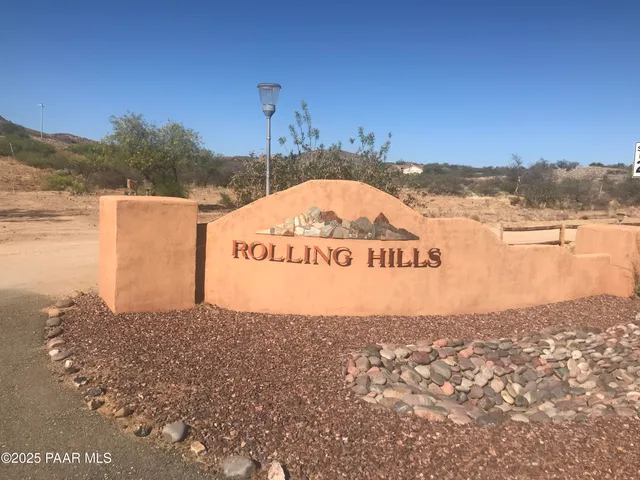 a view of a ocean with a building in the background