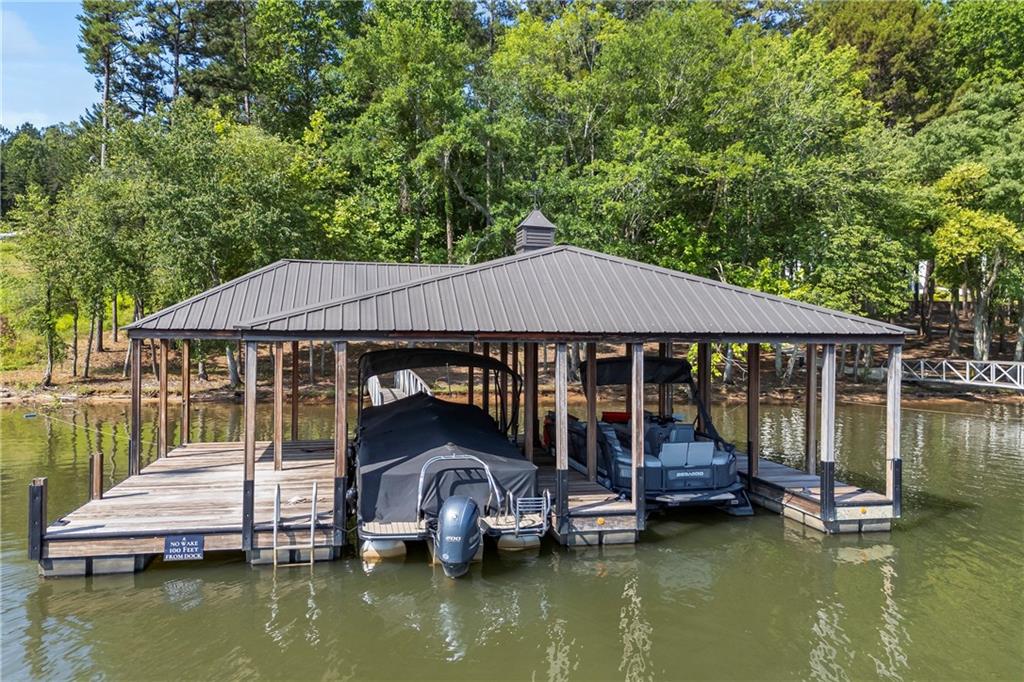 1132 Edgewater Trail Toccoa, GA 30577 - Photo 12 of 51 a view of house with swimming pool in front of it