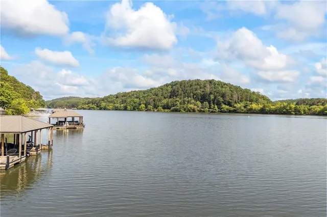 swimming pool view with a sitting space