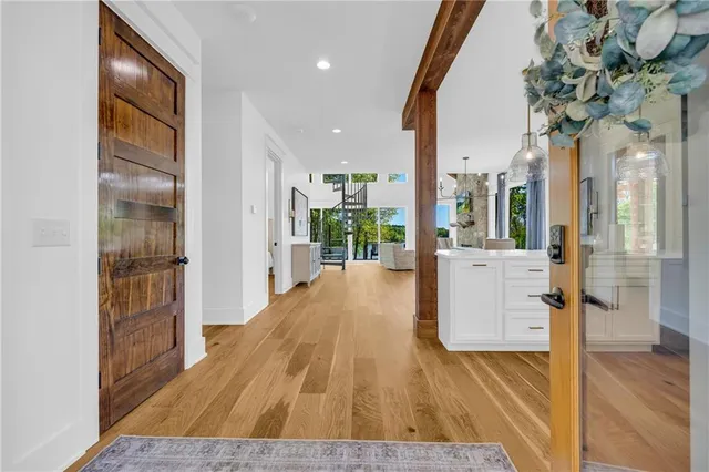 a kitchen with stainless steel appliances a refrigerator and a stove top oven