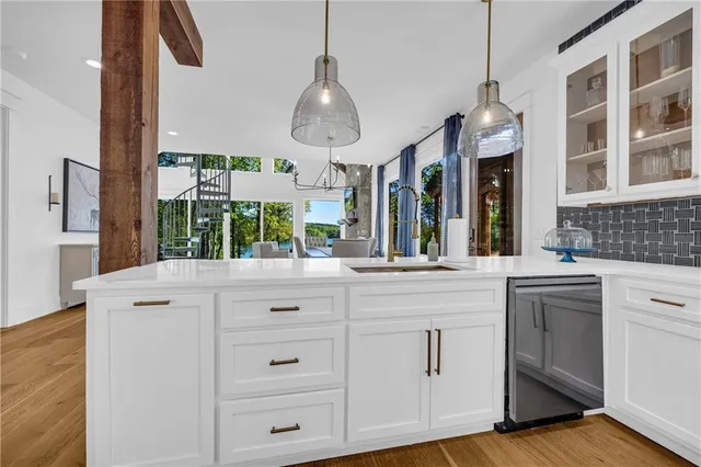 a kitchen with a stove and a sink
