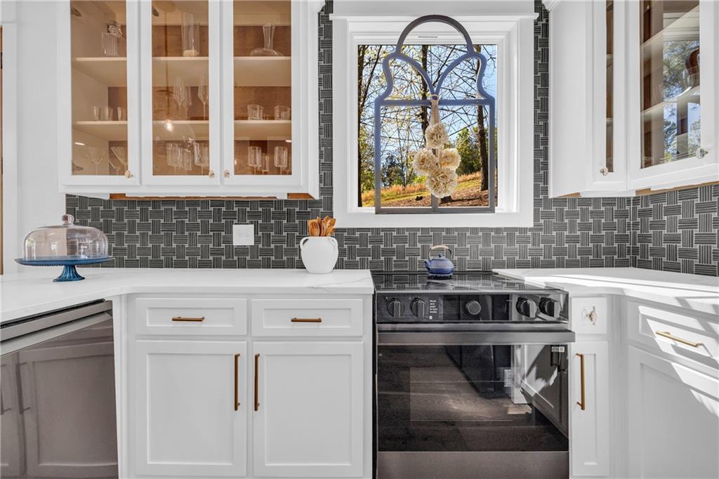 1132 Edgewater Trail Toccoa, GA 30577 - Photo 21 of 51 a kitchen with a stove and a sink