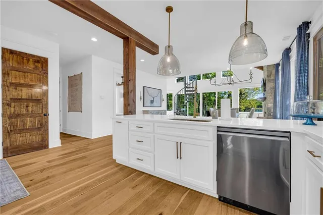 a view of a bathroom with a washer and dryer