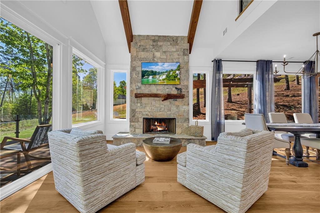 1132 Edgewater Trail Toccoa, GA 30577 - Photo 34 of 51 a living room with furniture large window and fireplace